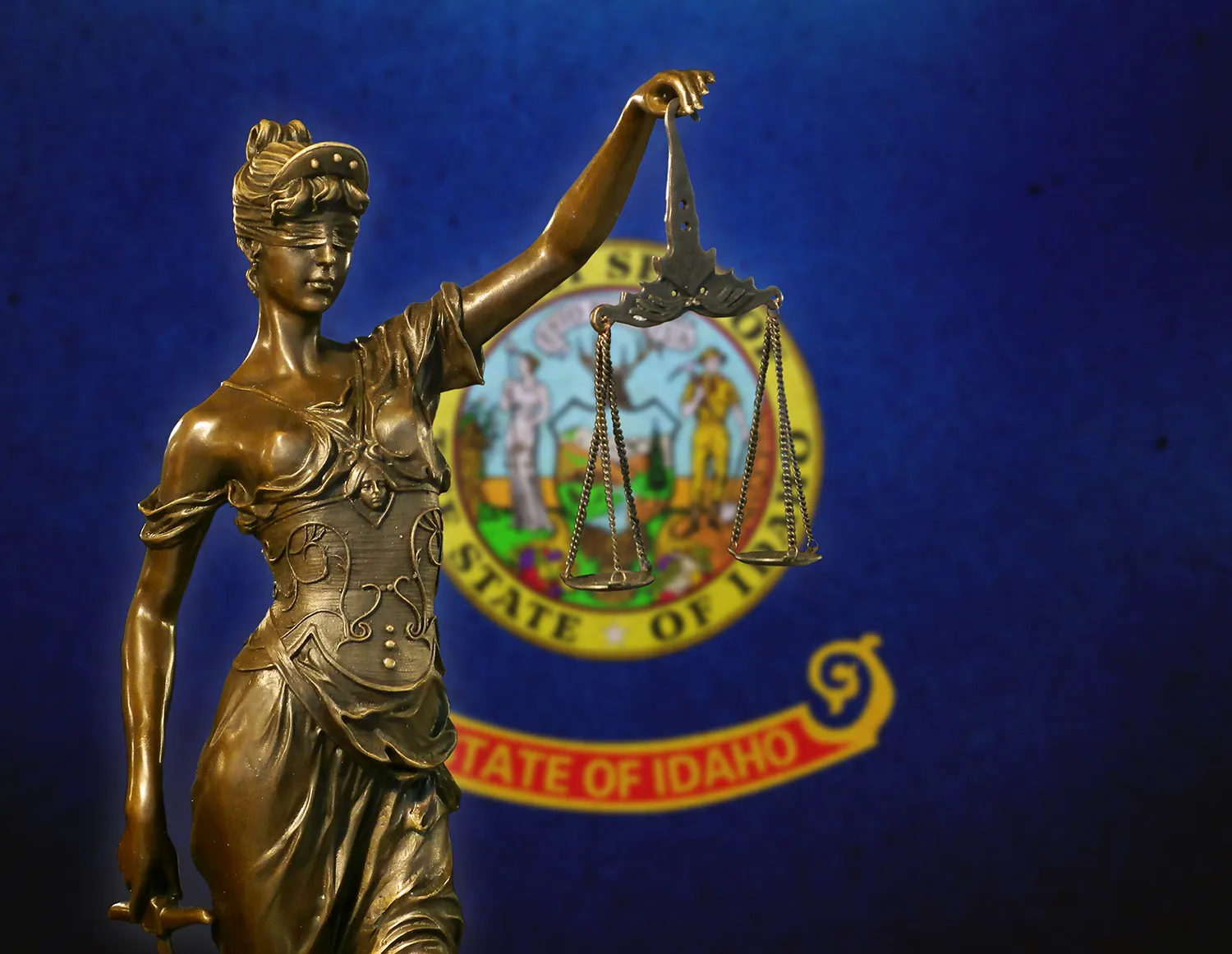 Lady Justice with Idaho state seal